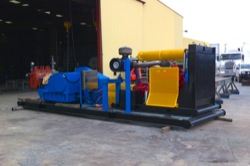Self contained, skid mounted sludge pump and motor unit