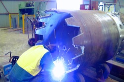 Cutting head for drilling rig